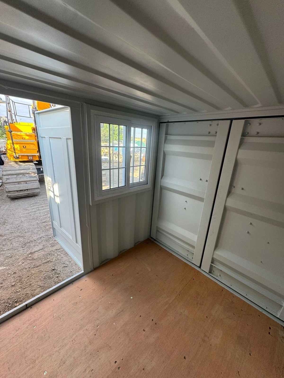 Brand new 7ft shipping container with window and personnel access door
