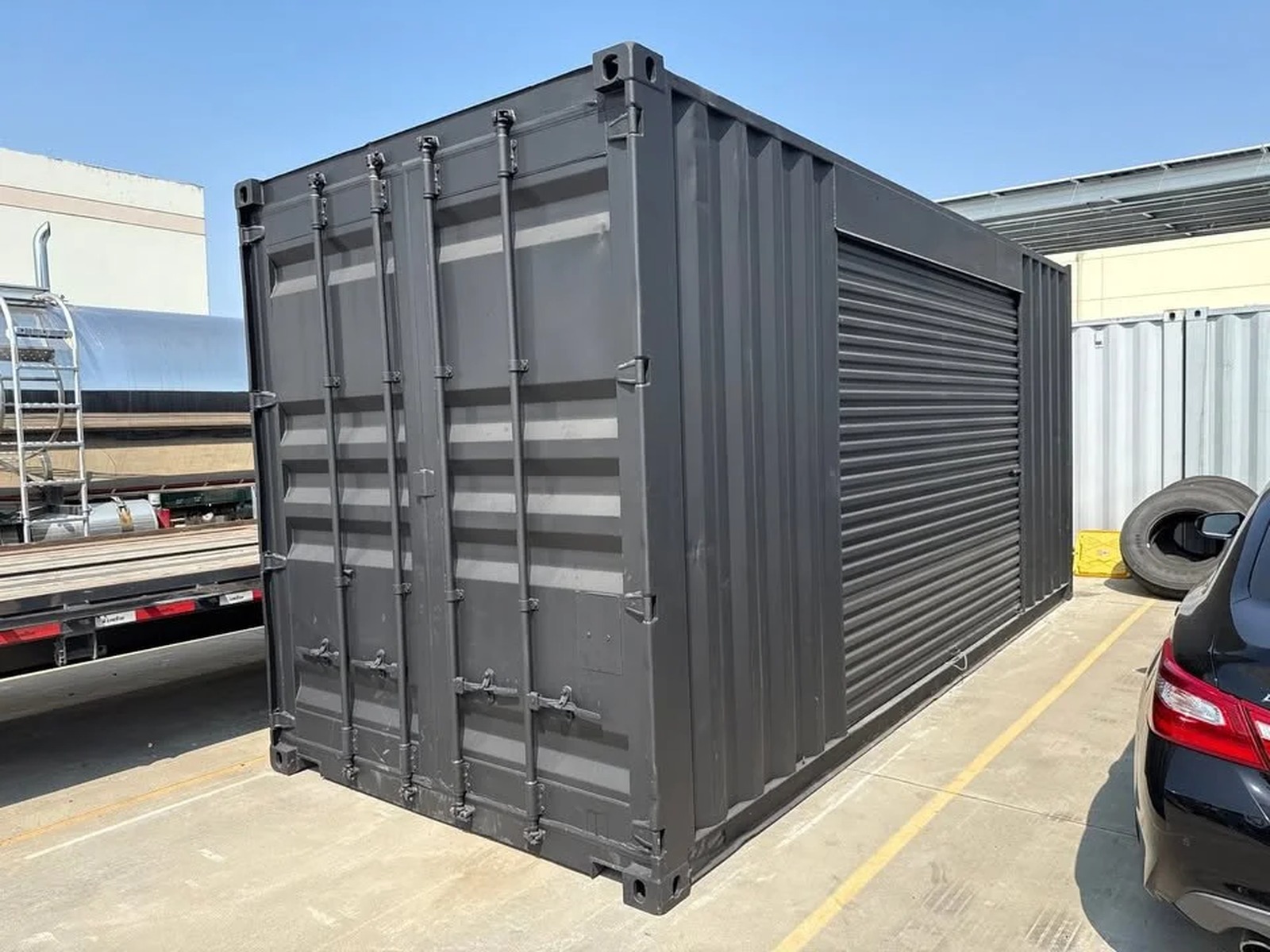 20ft Shipping Container - Matte Black With 12ft Side Roll-Up Door - photo 1