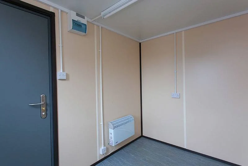 Clean 20ft office container with insulated interior and electrical installation